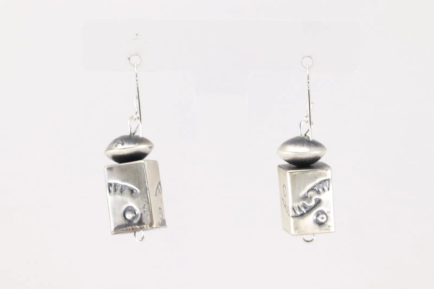 Handmade and stamped Native made barrel and saucer bead earrings