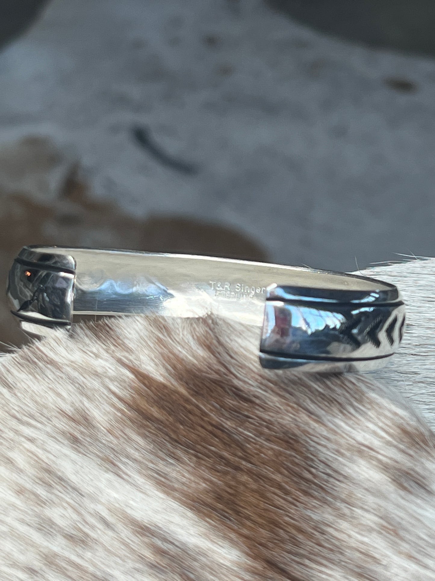 GENUINE STERLING SILVER NAVAJO TOMMY AND ROSE SINGER CUFF