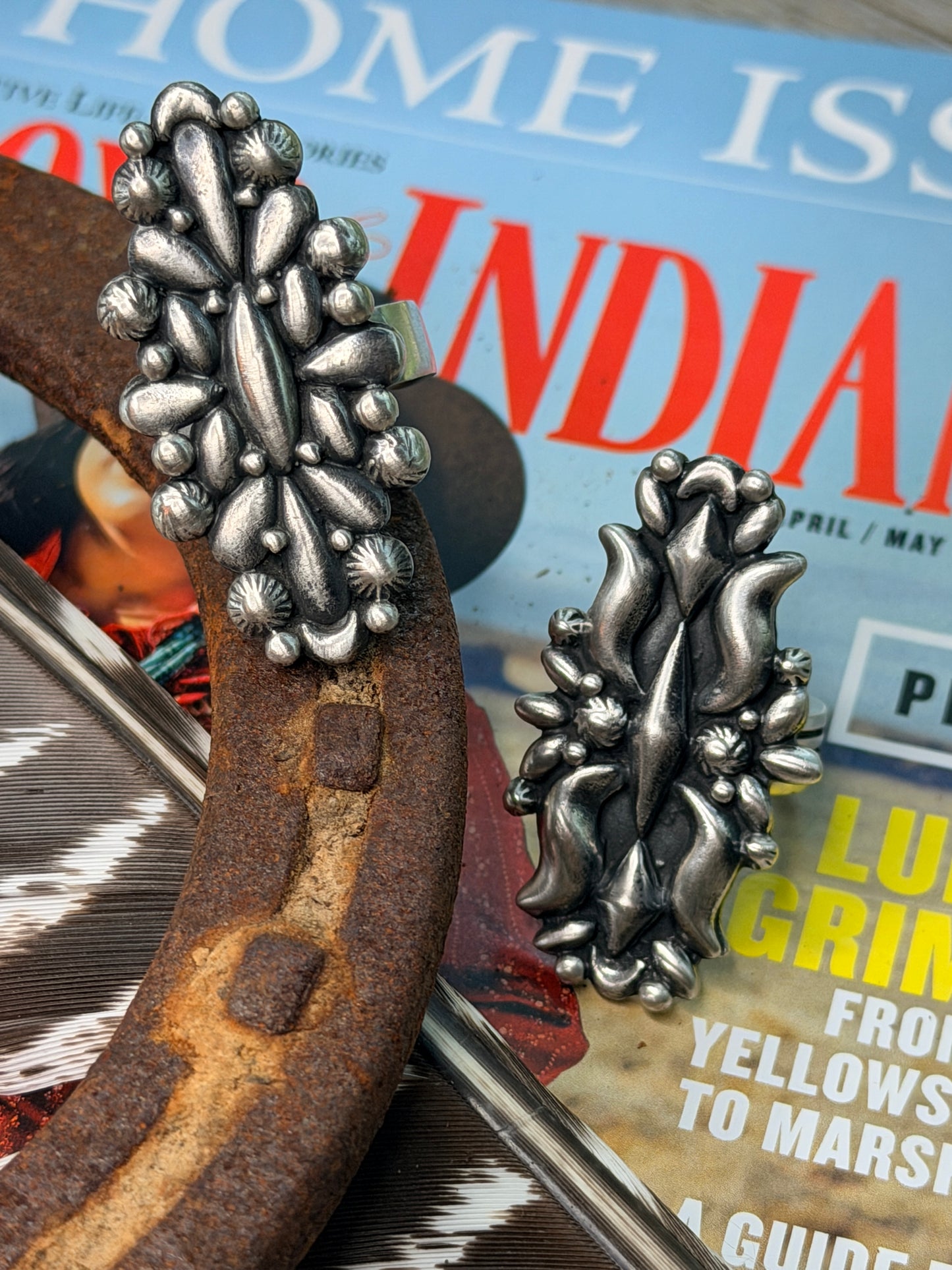 Handcrafted Native American sterling silver ring, featuring a intricate concho-style design with dimensional silver details