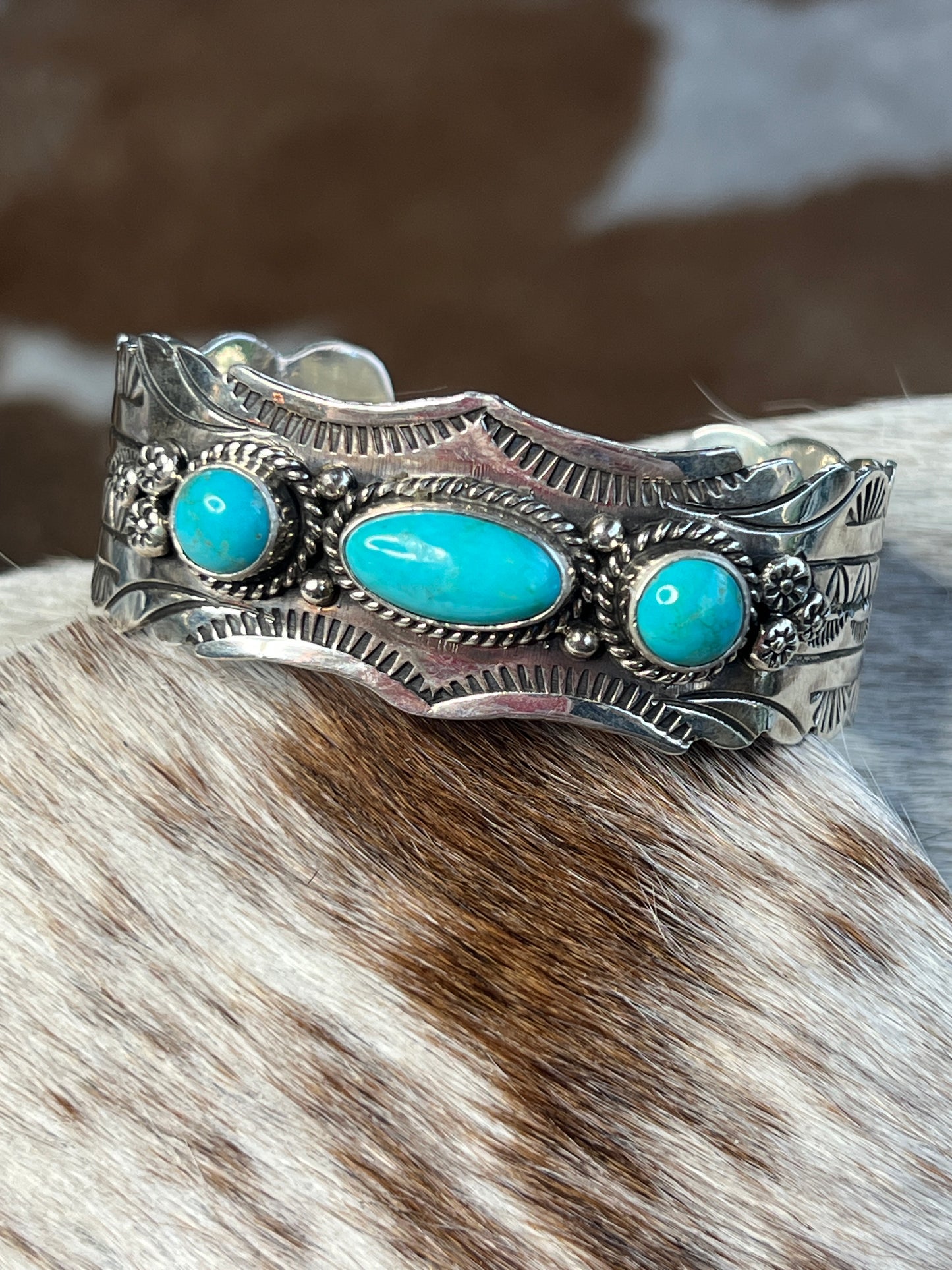 Turquoise with Hearts, Scared Sunrise and detailed stamping cuff by Yazzie