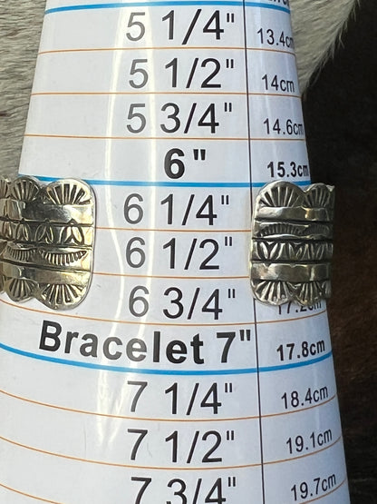 Turquoise with Hearts, Scared Sunrise and detailed stamping cuff by Yazzie
