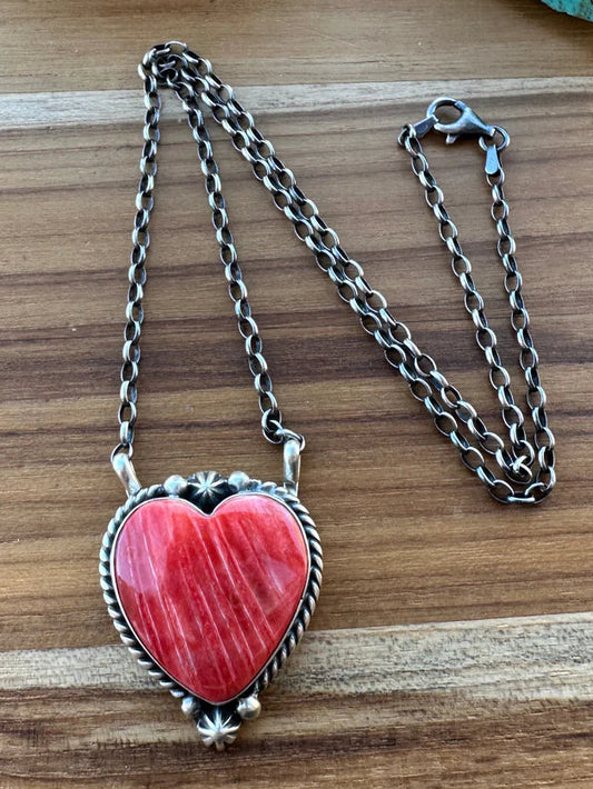 Sterling Silver
Red Spiny
Stamped and Hallmarked
By Donovan Skeets
Pendant 1" Across the Top
Measures 18" End to End
Secure Clasp
Adjustable chain